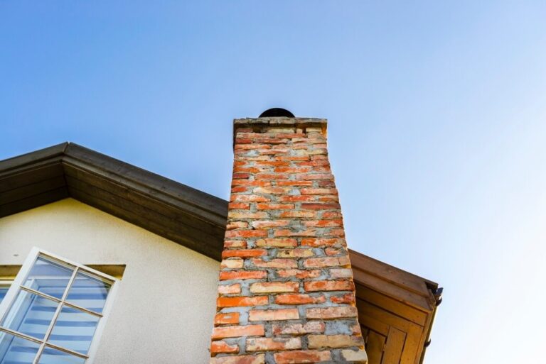An image of house with beige stucco