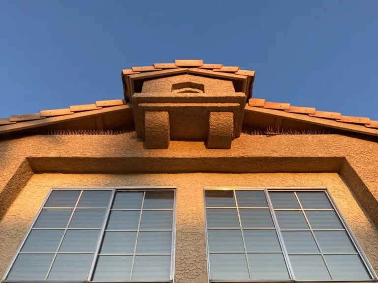 part of house with beige stucco