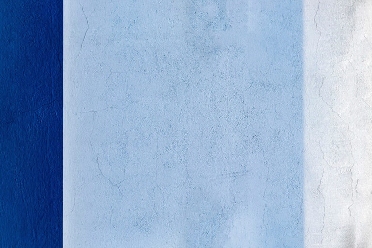 image of a wall with blue stucco
