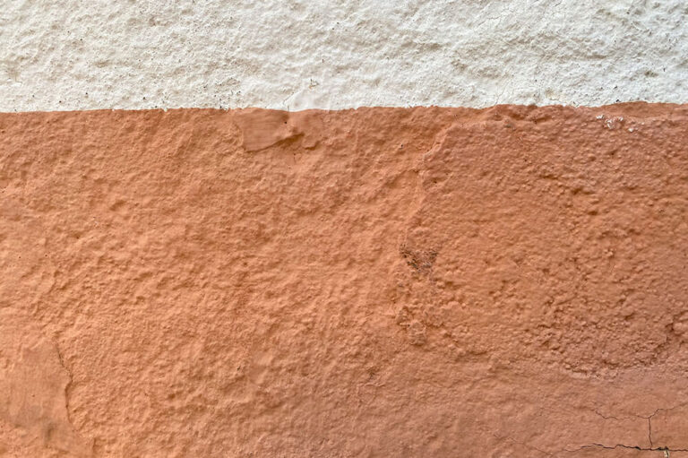 image of wall with white and brown stucco