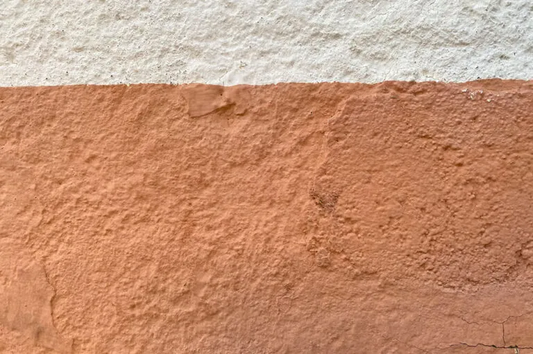 image of wall with white and brown stucco