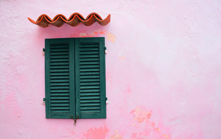image of a wall with pink stucco