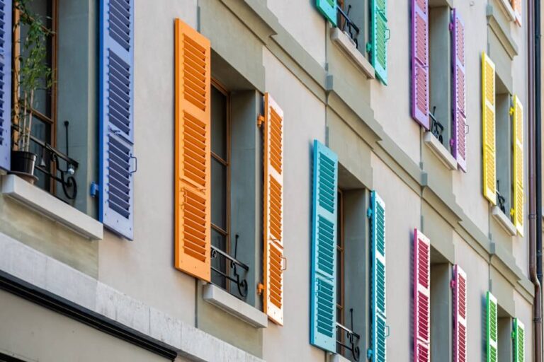 image of a house with multi-colored shutters