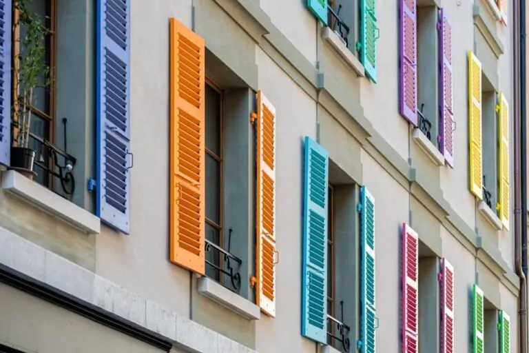image of a house with multi-colored shutters
