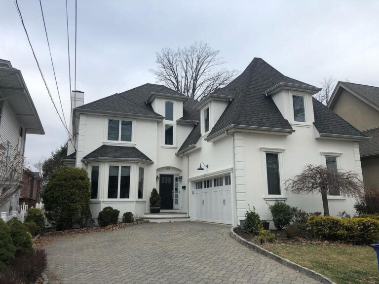image of big house with white stucco