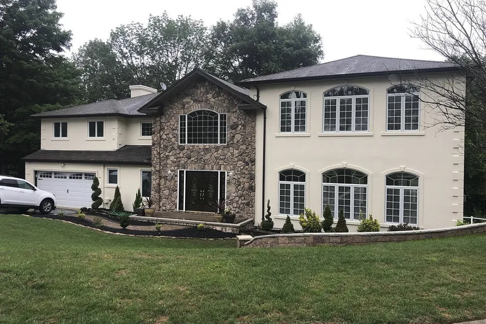 image of house 2 with ZD Stucco Repair's stucco