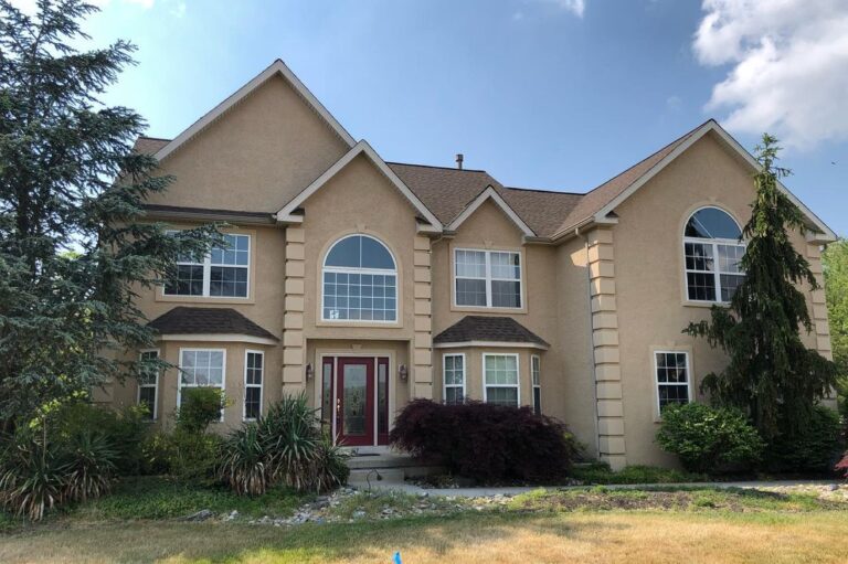 image of house with beige stucco