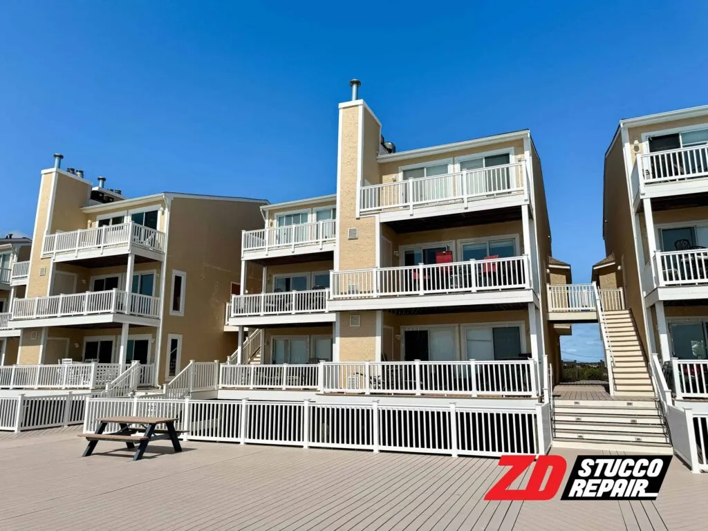 Restored beachfront condo buildings with new stucco, sealed seams, cement boards, and fresh elastomeric paint
