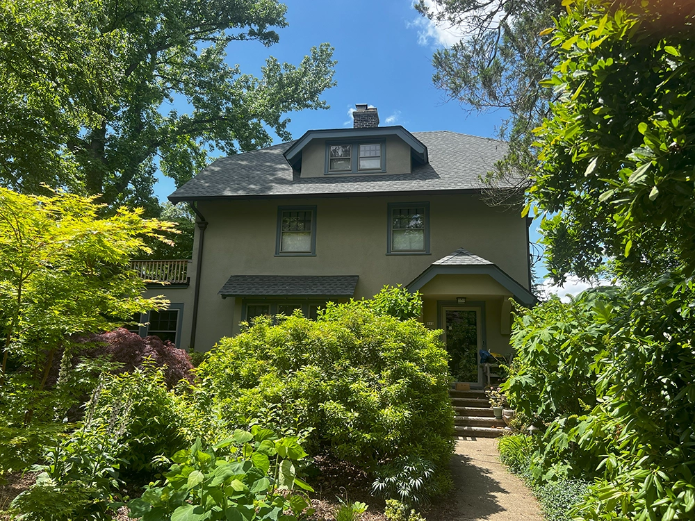 Stucco Repair and Installation in Montclair, NJ 3 Two-story home in Montclair, NJ with a smooth light stucco exterior and clean window trim; project by ZD Stucco Repair.