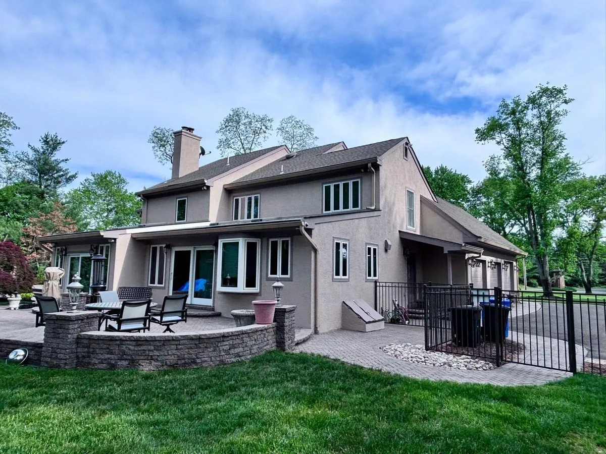 Moorestown NJ 4 Applying a fresh coat of stucco paint to the exterior