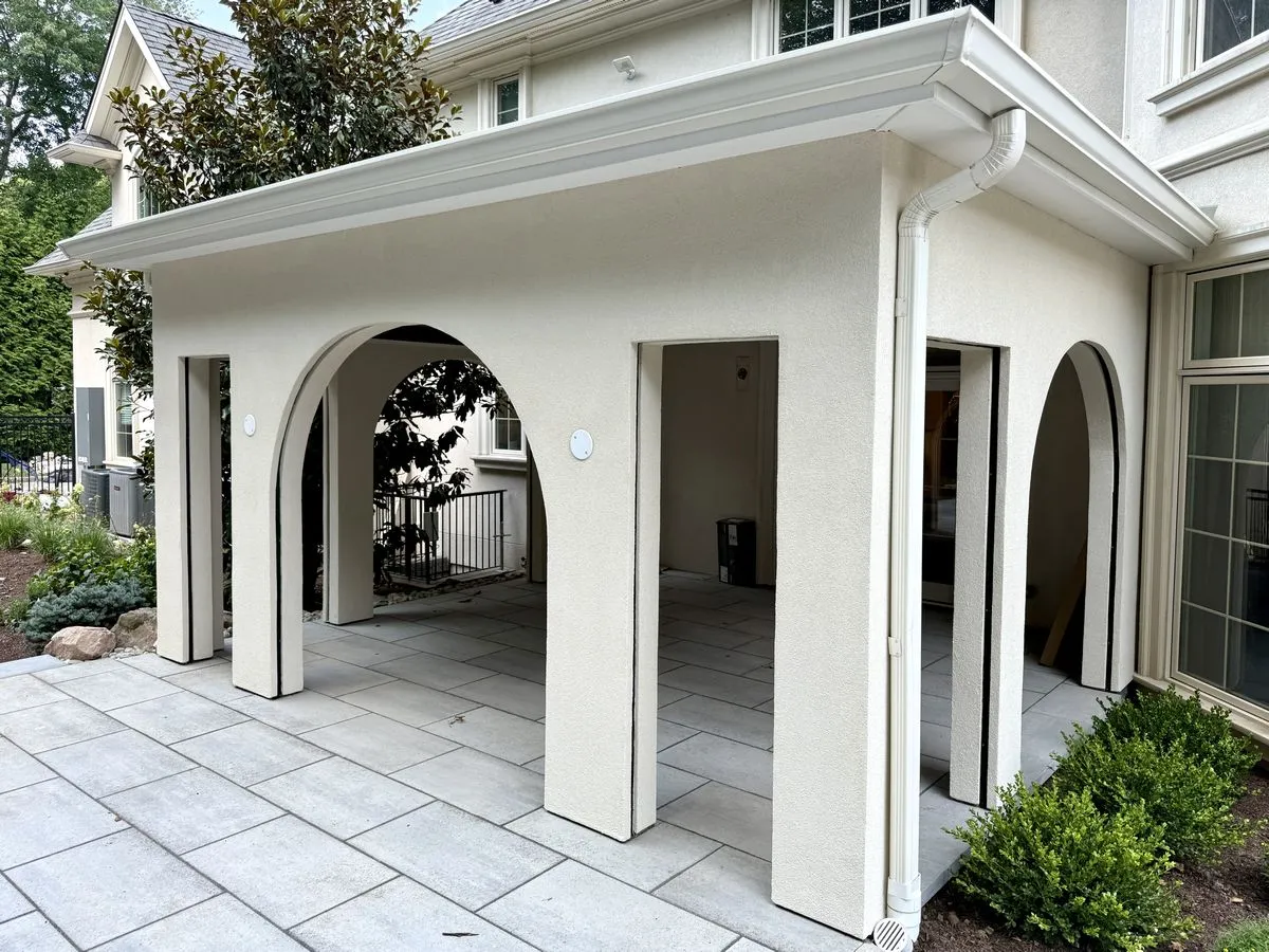 New stucco seamlessly blended with old stucco surface