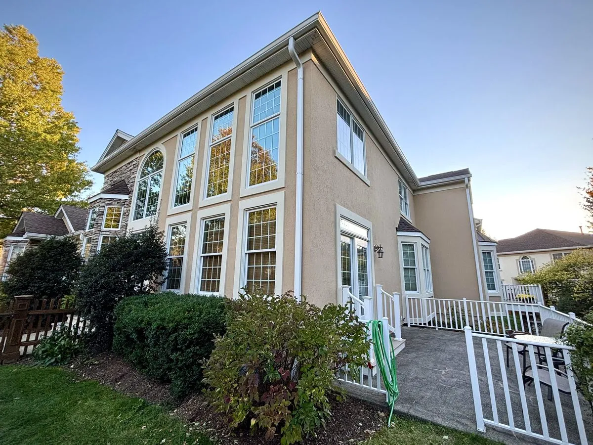 Chester NJ 10 Power washing the exterior stucco to remove dirt and prepare for painting