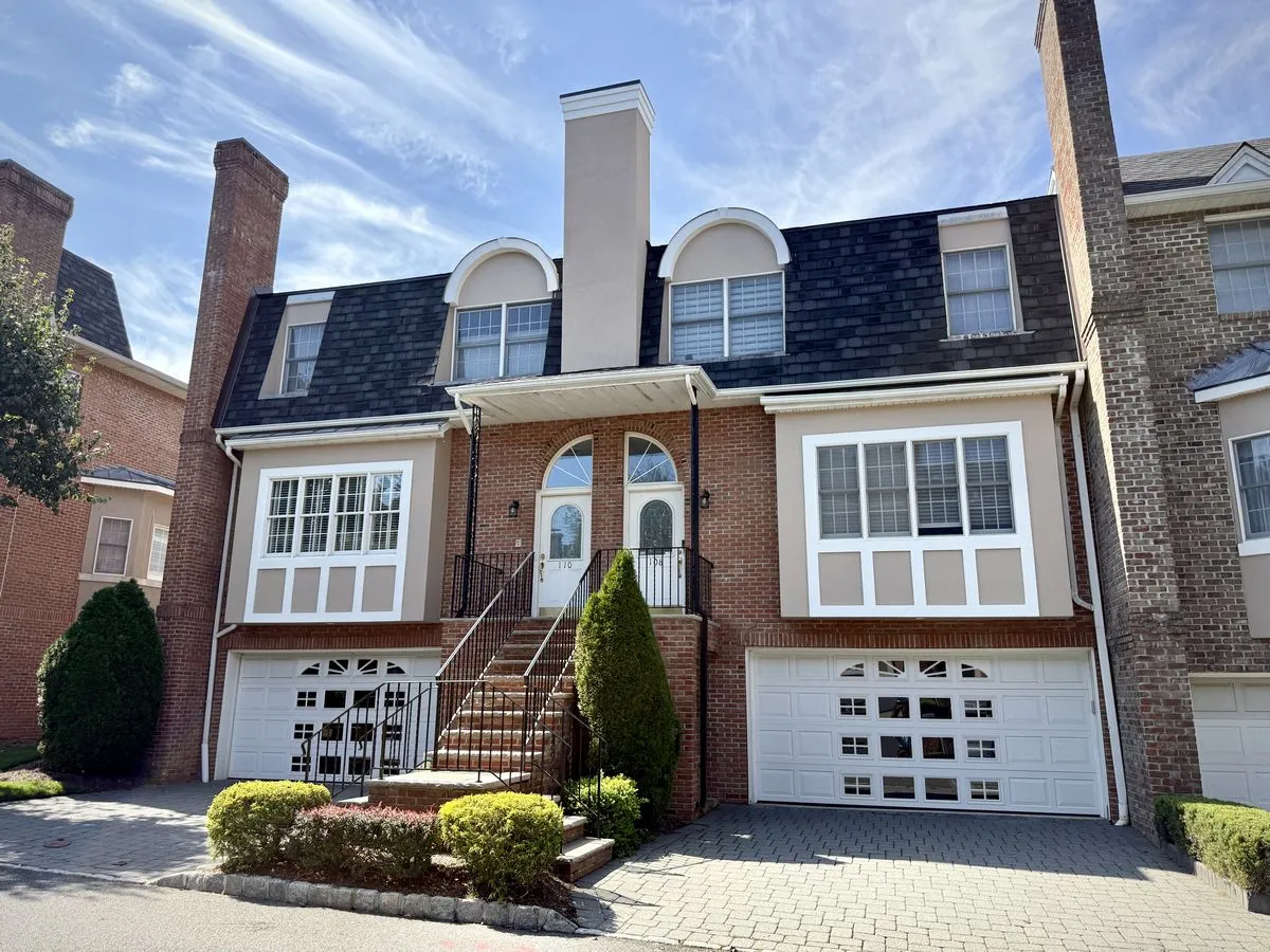 Final view of the Cresskill home after stucco restoration
