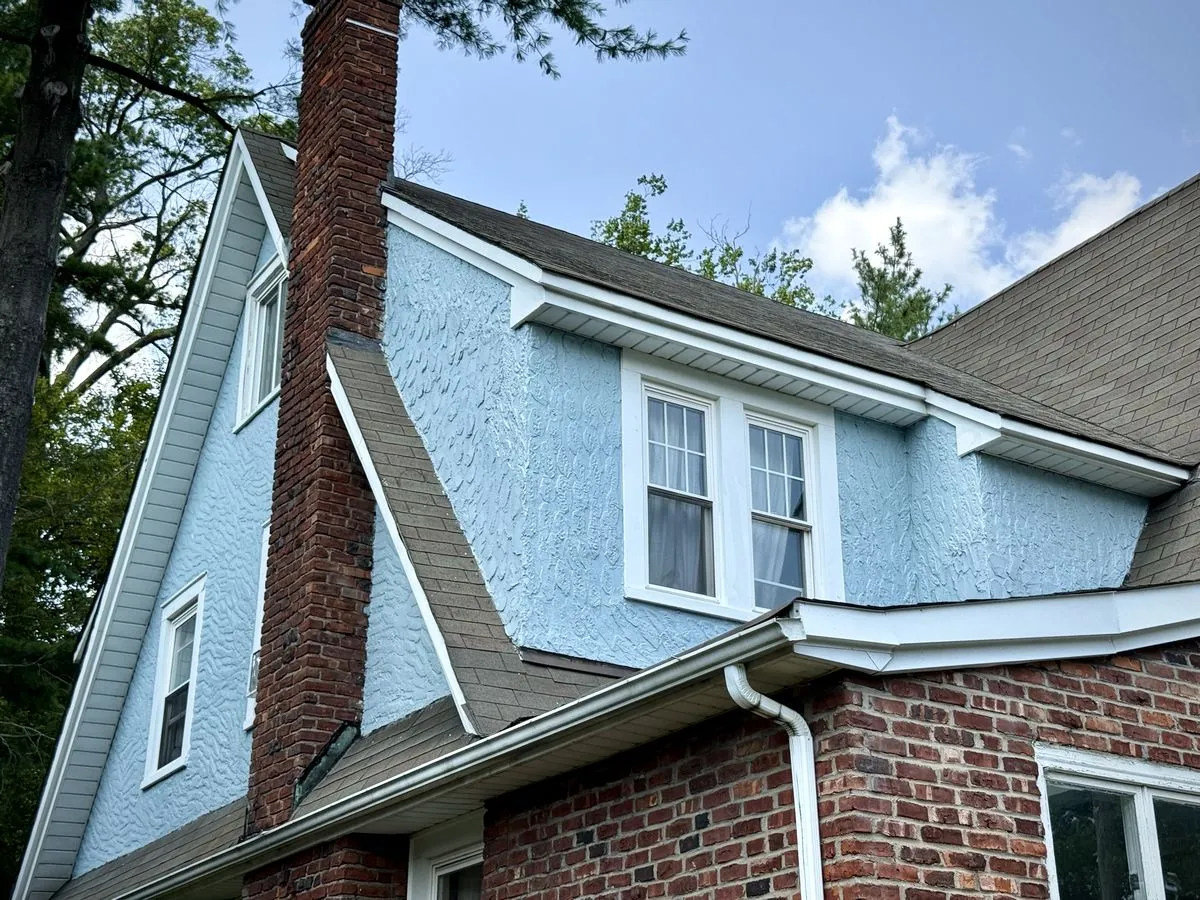 Teaneck NJ 3 Home with a fully restored stucco finish and renewed curb appeal