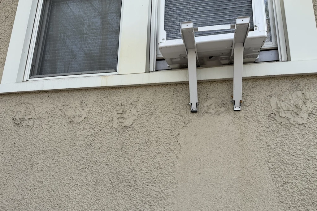 How to Match Stucco Texture During Repair So Your Exterior Looks Seamless 3 Stucco texture matching around a window after exterior stucco repair in NJ
