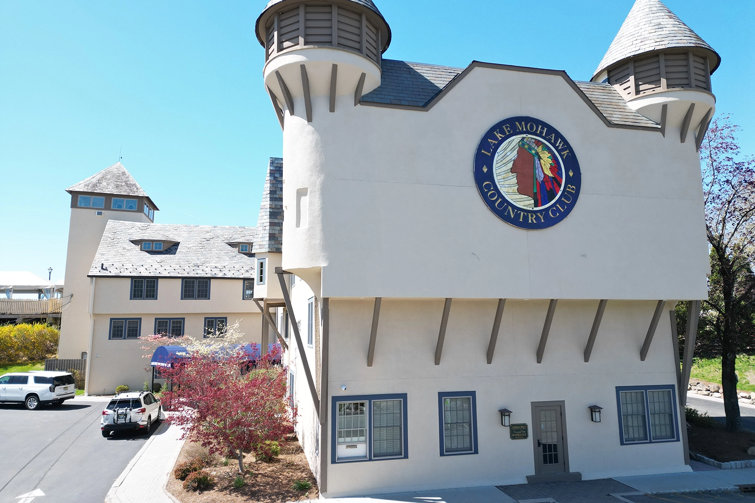 Front view of Lake Mohawk Country Club in Sparta, NJ after historic stucco facade restoration by ZD Stucco Repair
