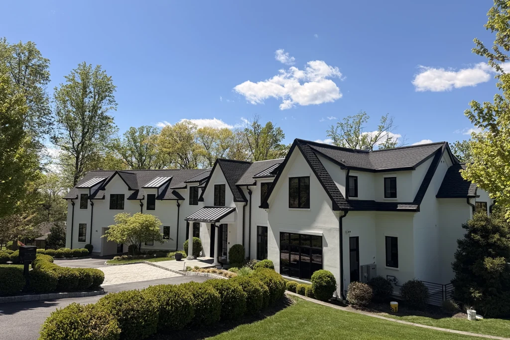 Stucco Repair vs Repainting: What Does Your New Jersey Home Need? 7 Finished New Jersey home with professionally repaired and repainted white stucco exterior