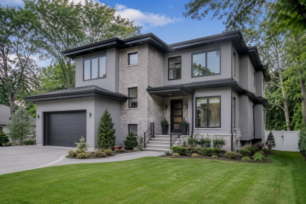 15 Gray Stucco House Ideas: Light, Dark, White Trim & Black Accents 12 gray stucco house brick accents