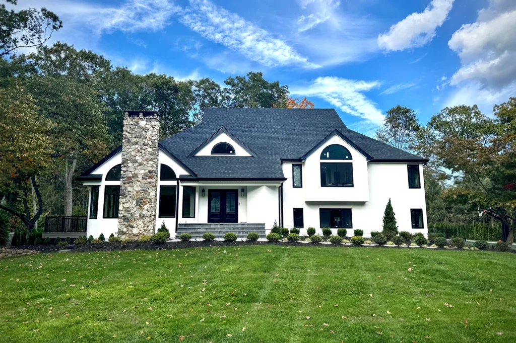 Restored front exterior wide at Upper Saddle River residence in Upper Saddle River, NJ.