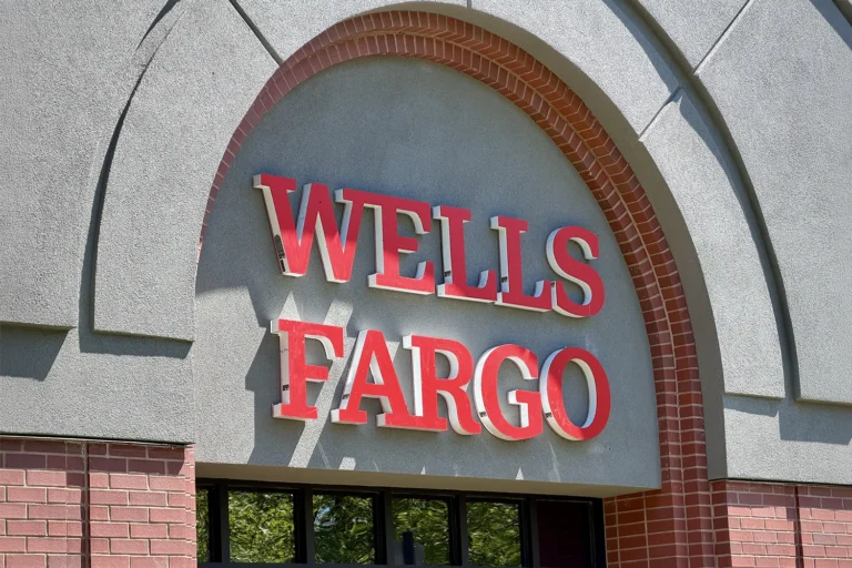 Commercial stucco repair around the Wells Fargo building entrance.